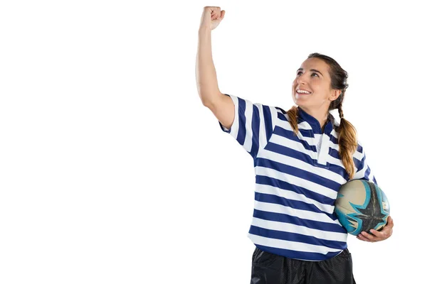 Female athlete holding rugby ball — Stock Photo, Image