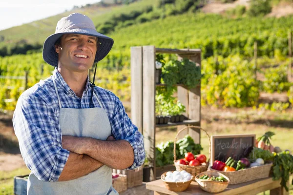 Portrait of farmer standing with arms crossed — Stock Photo, Image