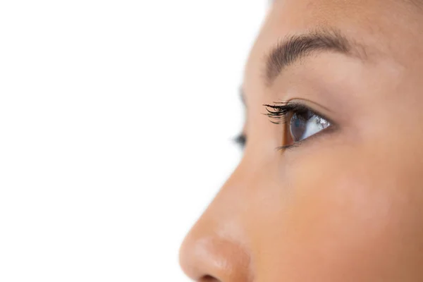 Naisen silmä ja nenä — kuvapankkivalokuva