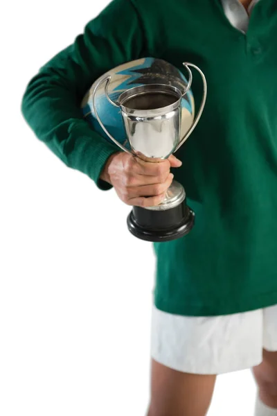 Kobieta z rugby piłka i trofeum — Zdjęcie stockowe
