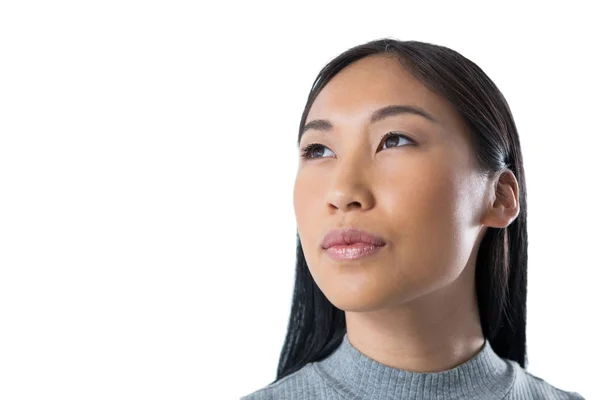 Woman standing against white — Stock Photo, Image