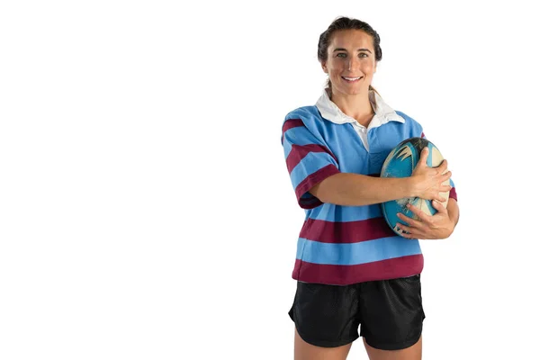 Jogador feminino segurando bola de rugby — Fotografia de Stock