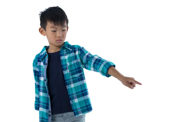 Cute boy pointing finger — Stock Photo, Image
