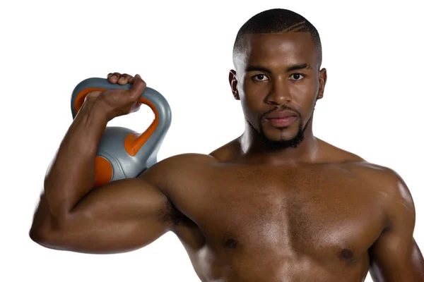 Sportman hijs kettlebell — Stockfoto