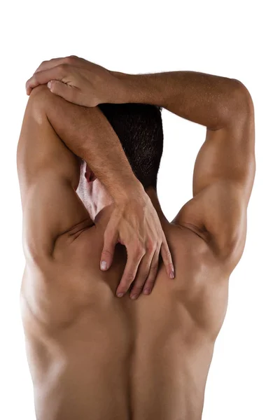 Shirtless persona sportiva stretching mani — Foto Stock