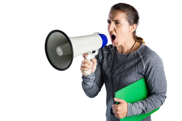 Female rugby coach shouting on megaphone — Stock Photo, Image