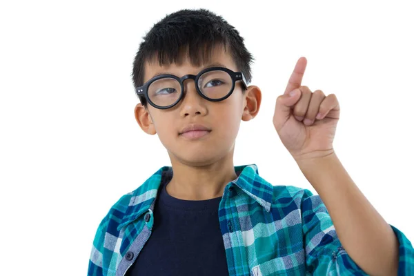 Boy pretending to touch an invisible screen — Stock Photo, Image