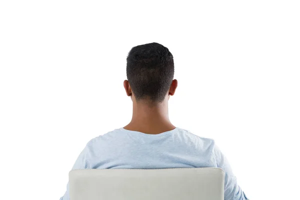 Homem sentado na cadeira — Fotografia de Stock