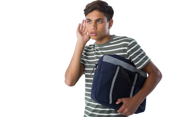 Niño escuchando en secreto con las manos detrás de las orejas —  Fotos de Stock