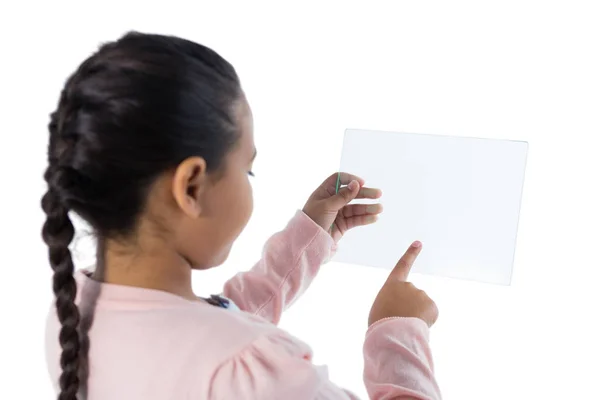 Girl using a glass digital tablet — Stock Photo, Image