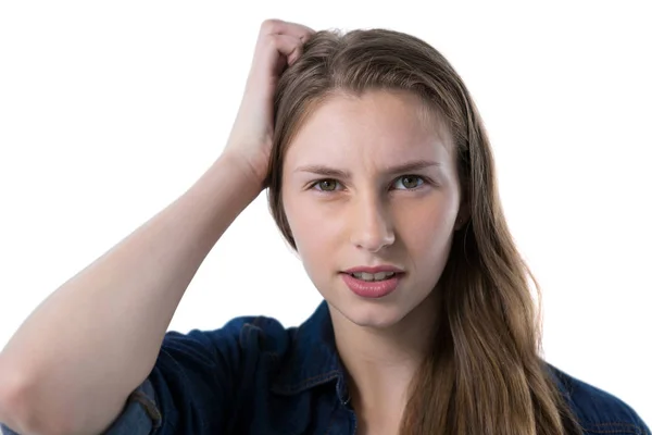 Confused teenage girl looking at camera — Stock Photo, Image