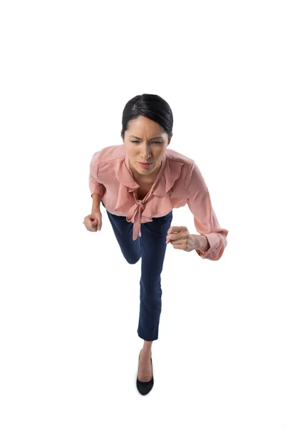 Female executive in ready position — Stock Photo, Image