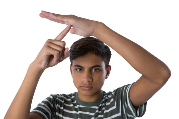 Pojke att göra en timeout hand gest — Stockfoto