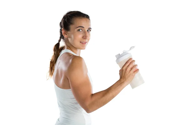 Atleta mujer sosteniendo botella —  Fotos de Stock