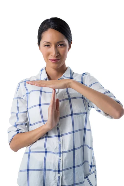 Mujer haciendo tiempo de espera gesto de la mano —  Fotos de Stock