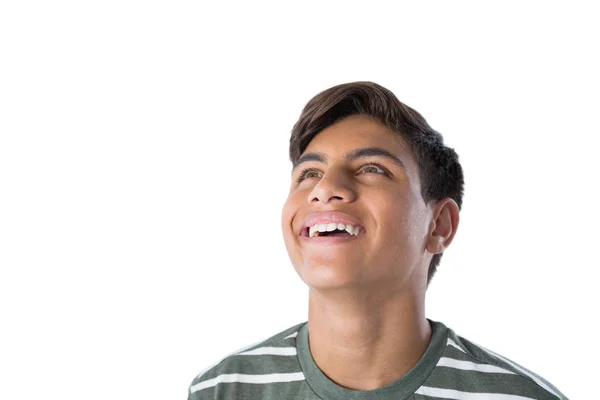 Usmívající se dospívající kluk koukal — Stock fotografie