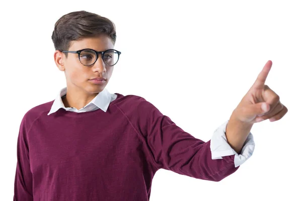 Teenage boy touching an invisible screen — Stock Photo, Image