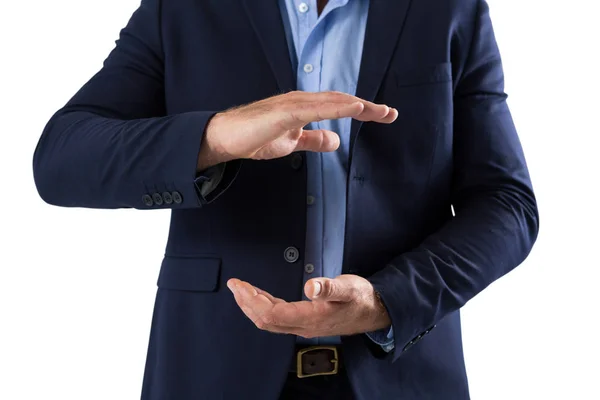Businessman pretending to hold something — Stock Photo, Image