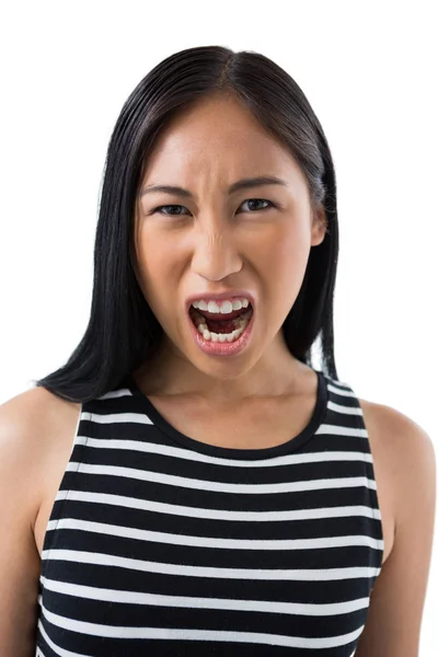 Depressed woman standing against white — Stock Photo, Image