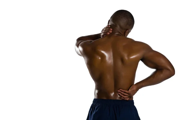 Shirtless sportsman suffering from pain — Stock Photo, Image