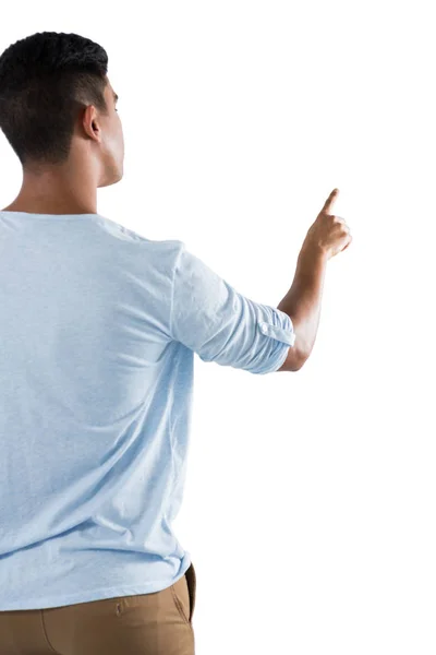 Man pretending to touch an invisible screen — Stock Photo, Image