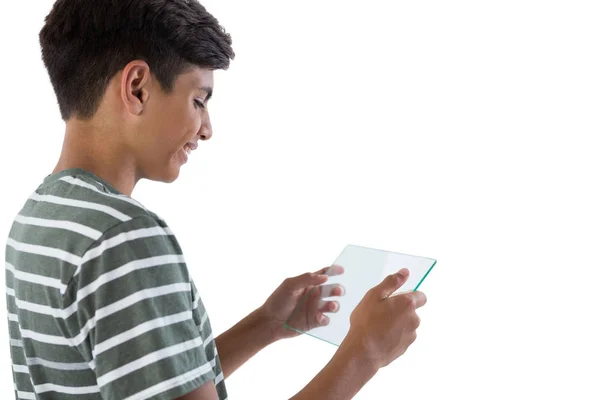 Nastoletni chłopiec przy użyciu tabletu szkła — Zdjęcie stockowe