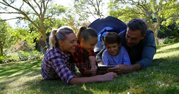 Family taking a selfie outside the tent — Stock Video