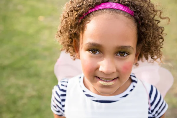 Ragazza con vernice viso — Foto Stock