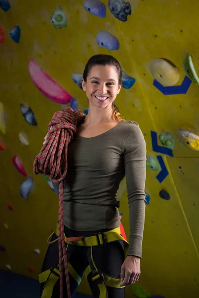 Woman with rope in fitness studio — Stock Photo, Image