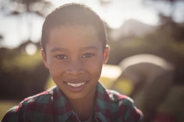 Smiling boy looking at camera — Stock Photo, Image