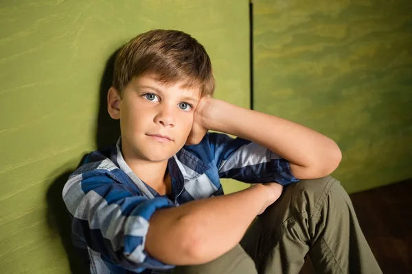 Boy sitting at home — Stock Photo, Image
