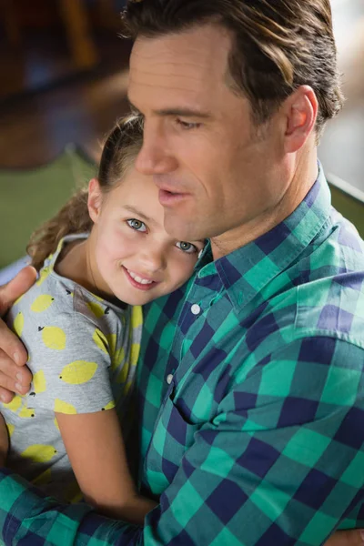 Father embracing her daughter — Stock Photo, Image