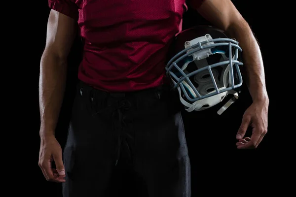 Football player holding head gear — Stock Photo, Image