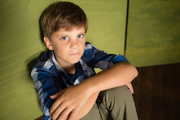 Boy sitting at home — Stock Photo, Image