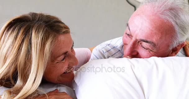 Senior couple interacting with each other on bed — Stock Video