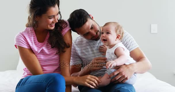 Parents playing with their baby girl — Stock Video