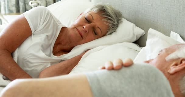 Senior couple sleeping in the bedroom — Stock Video