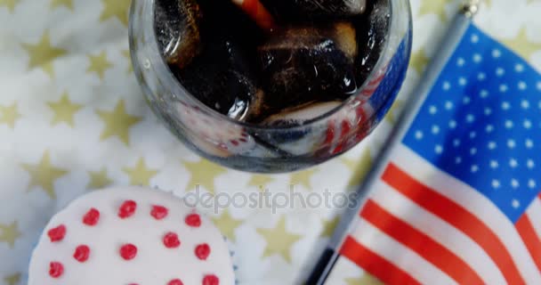 Close-up of drink and cupcake with 4th july theme — Stock Video