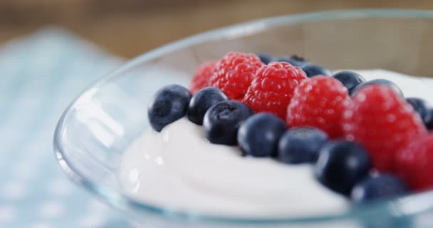 Fruit ice cream on wooden table — Stock Video