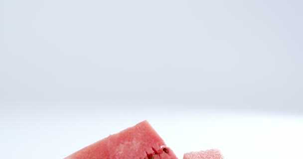 Watermelon pieces on white background — Stock Video