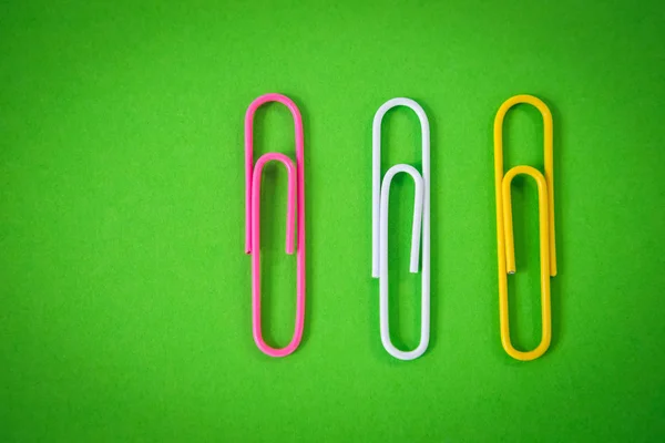 Close up of paper clips on paper — Stock Photo, Image