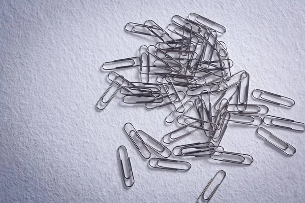 Paper clips on white background — Stock Photo, Image