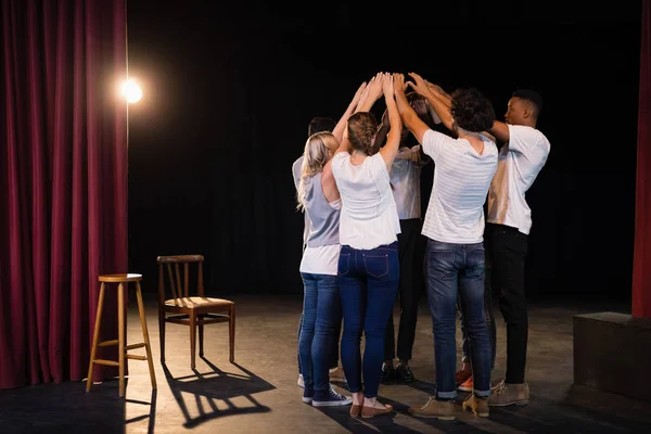 Actors team forming their hands stacked — Stock Photo, Image