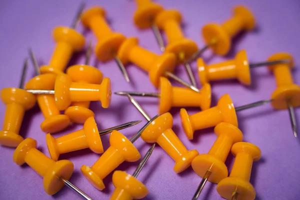 Yellow paper pins on paper — Stock Photo, Image