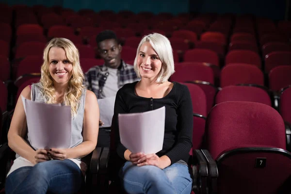 Actors reading their scripts on stage in theatre — Stock Photo, Image