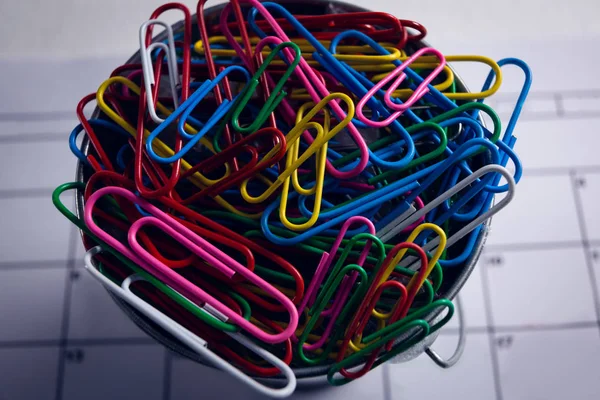 Colorful paper clips in bucket — Stock Photo, Image