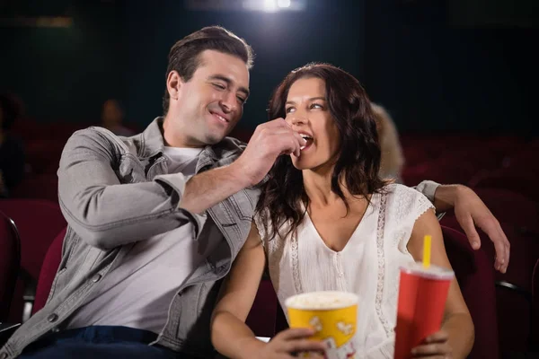 Couple watching movie in theatre — Stock Photo, Image