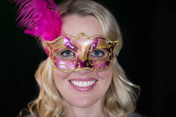 Woman wearing masquerade mask — Stock Photo, Image