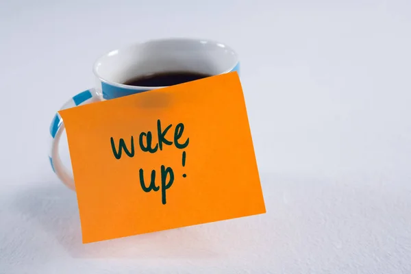 Black coffee with wake up message — Stock Photo, Image