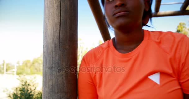 Tired woman wiping her sweat — Stock Video